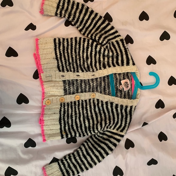 I am selling a Juicy Couture sweater. - Picture 1 of 3